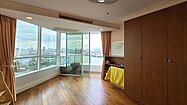 Yet another bedroom with a balcony