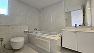 A chic bathroom with a bathtub
