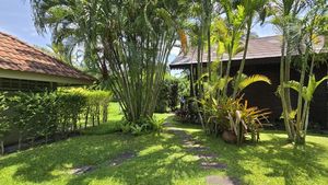 One of the guest-houses and a pump and storage-room