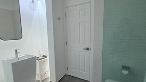 One of the three bathrooms