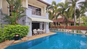 The pool and a shaded terrace